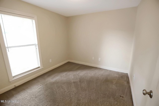 503 W Abbey Pl, Brandon, MS 39047 - spare room with baseboards and carpet flooring