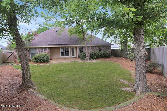 503 W Abbey Pl, Brandon, MS 39047 - rear view of house with a fenced backyard and brick siding