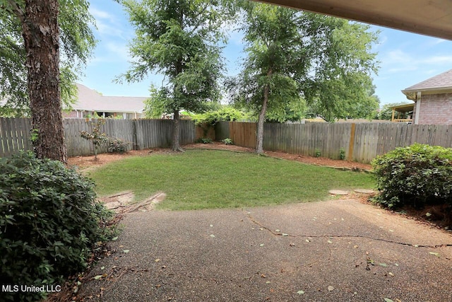 503 W Abbey Pl, Brandon, MS 39047 - fenced backyard with a patio area