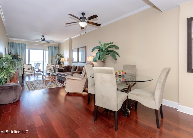 dining area with dark hardwood / wood-style floors, ceiling fan, and ornamental molding