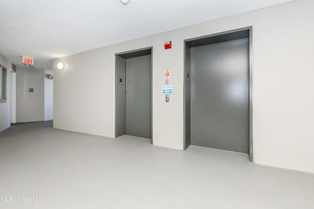 corridor featuring elevator