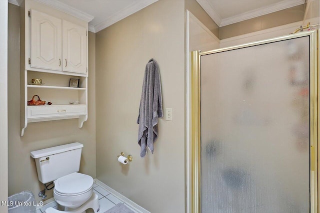 bathroom featuring tile patterned floors, toilet, a shower with shower door, and ornamental molding