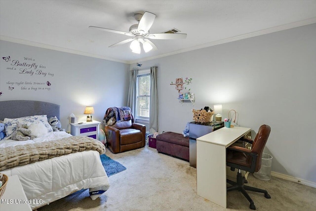 carpeted bedroom featuring ceiling fan and crown molding