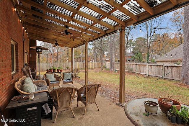 view of patio featuring an outdoor living space and ceiling fan