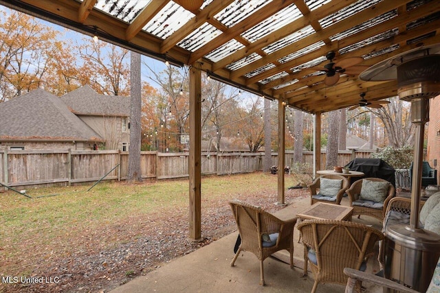 view of patio featuring ceiling fan