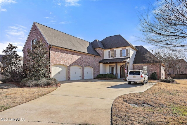 french country inspired facade with a garage