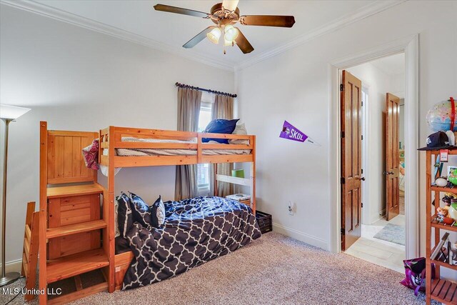 carpeted bedroom featuring crown molding