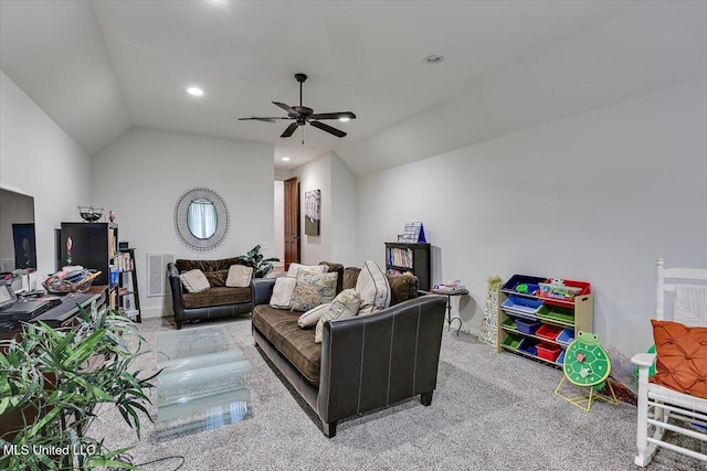 living room with ceiling fan, vaulted ceiling, and light carpet