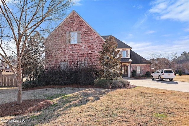 view of front of home with a front yard