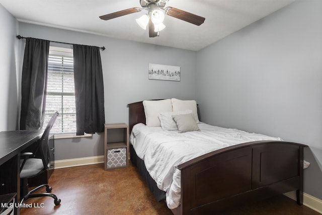 bedroom with ceiling fan and baseboards