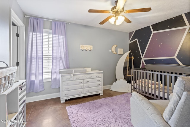 bedroom with baseboards, concrete flooring, and ceiling fan