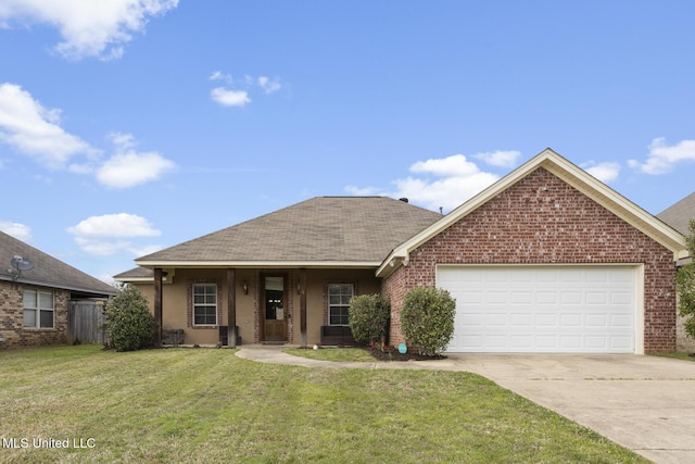 single story home featuring a front yard, an attached garage, brick siding, and driveway