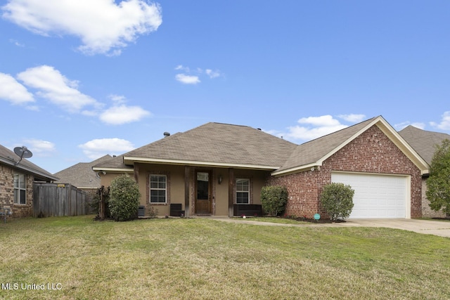 single story home with a shingled roof, a front lawn, fence, a garage, and driveway