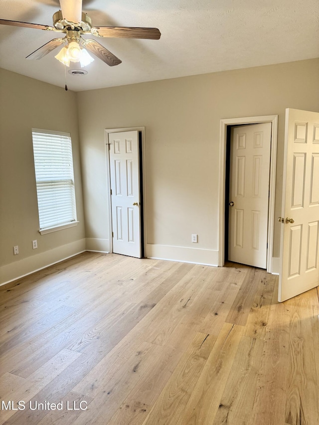 110 Cowles Creek Rd, Clinton, MS 39056 - unfurnished bedroom with light wood finished floors and baseboards