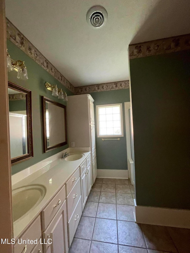 bathroom featuring vanity and tile patterned floors