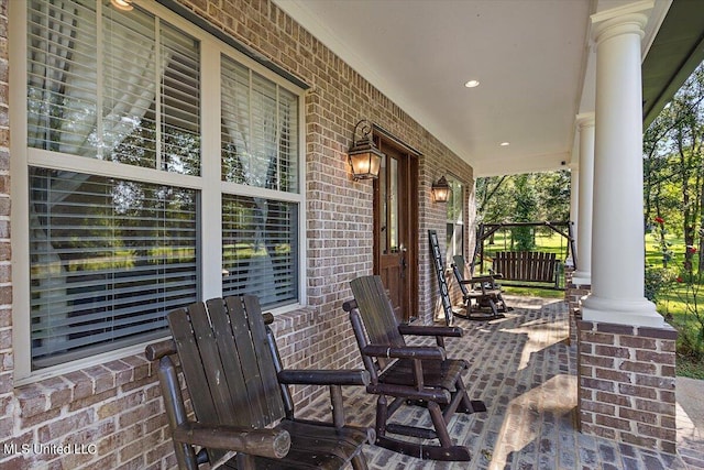 view of patio featuring covered porch