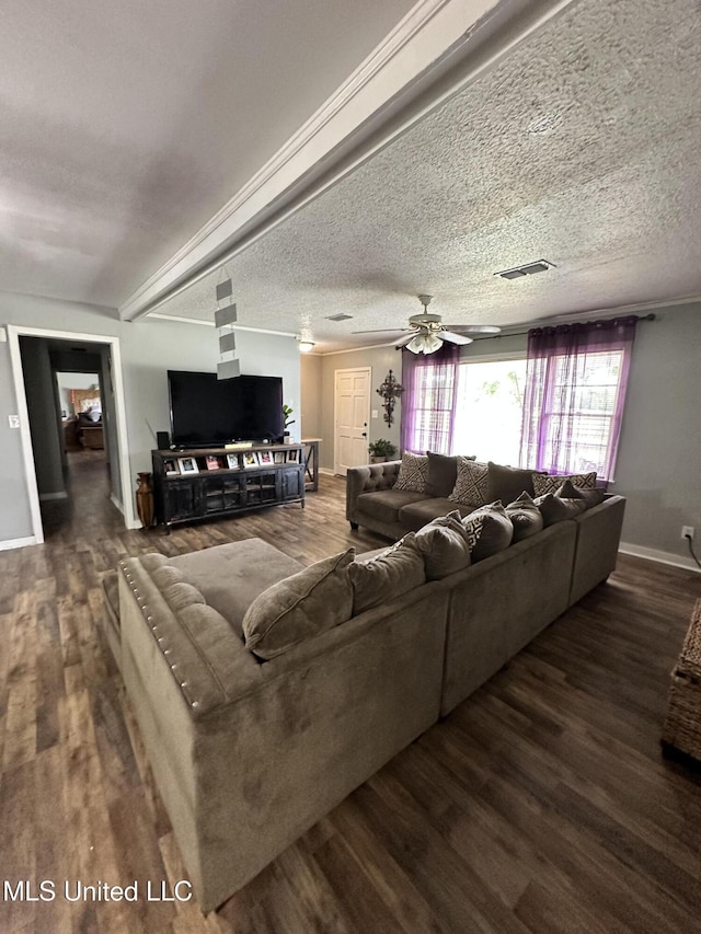1420 S 9th Ave, Columbus, MS 39701 - living area with baseboards, ceiling fan, wood finished floors, and visible vents