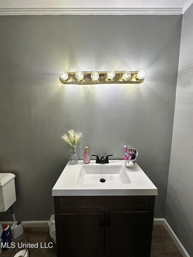 1420 S 9th Ave, Columbus, MS 39701 - half bathroom with baseboards and vanity