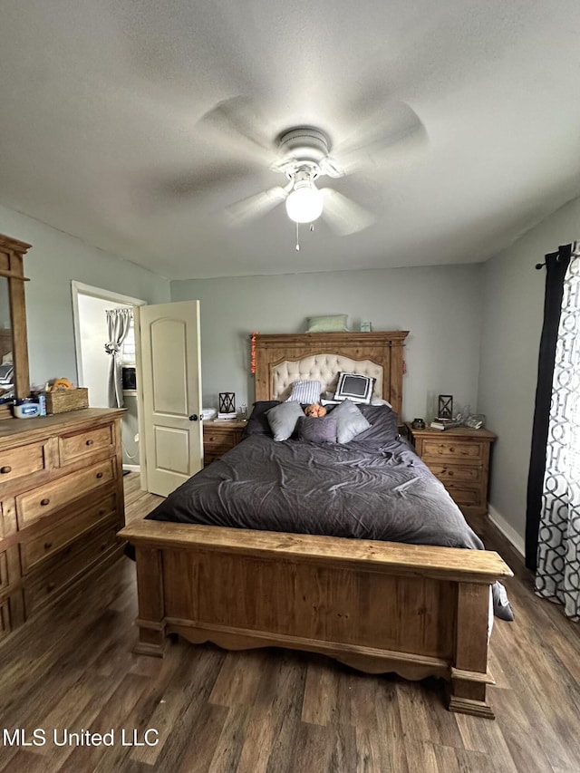 1420 S 9th Ave, Columbus, MS 39701 - bedroom featuring a ceiling fan and wood finished floors