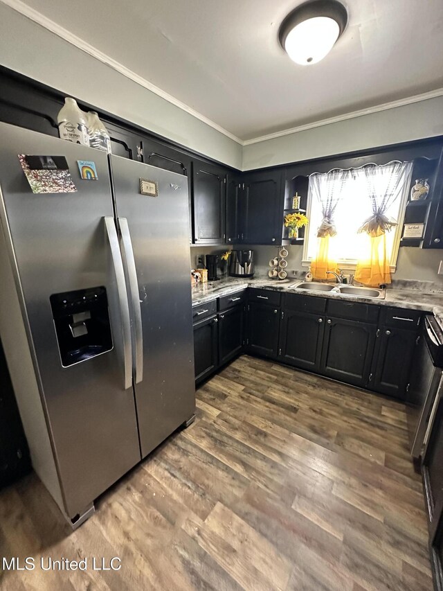 1420 S 9th Ave, Columbus, MS 39701 - kitchen featuring crown molding, a sink, stainless steel fridge with ice dispenser, dark cabinets, and dark wood finished floors