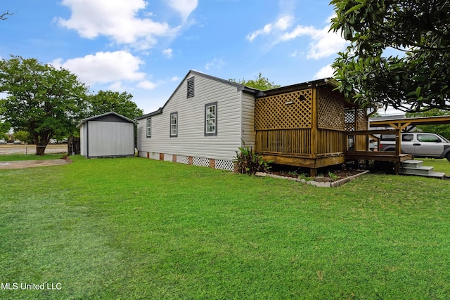 view of side of home with a lawn, an outdoor structure, and a shed