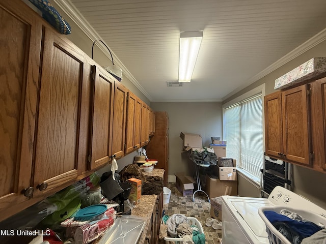 storage with washer / clothes dryer and visible vents