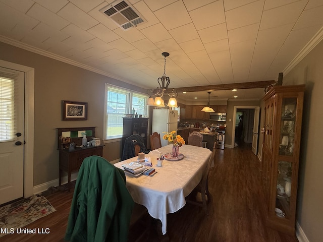dining area featuring baseboards, ornamental molding, dark wood-style flooring, and visible vents