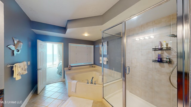 bathroom with tile patterned floors and plus walk in shower