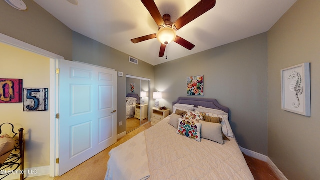 bedroom with ceiling fan and carpet floors