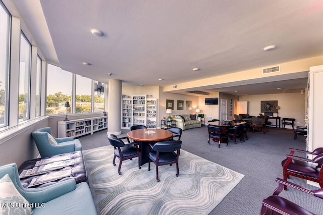 view of carpeted dining space