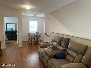 living area with wood finished floors