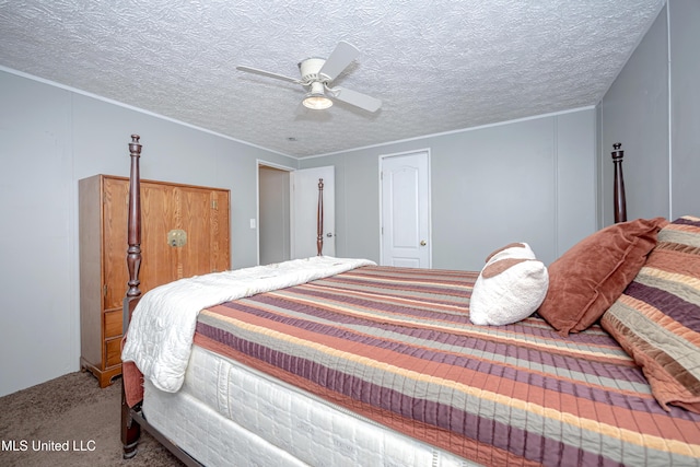 carpeted bedroom featuring ceiling fan, a textured ceiling, and ornamental molding
