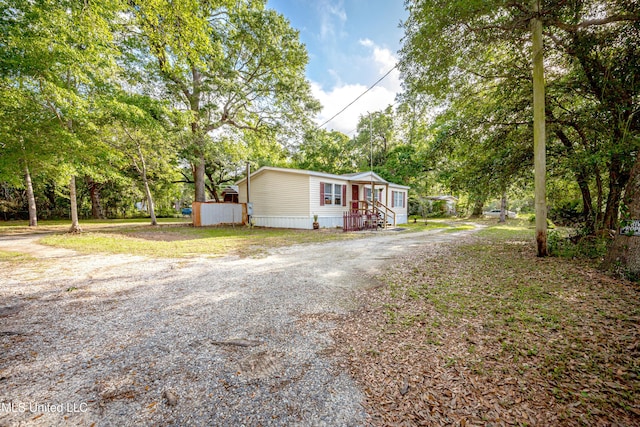 exterior space featuring gravel driveway
