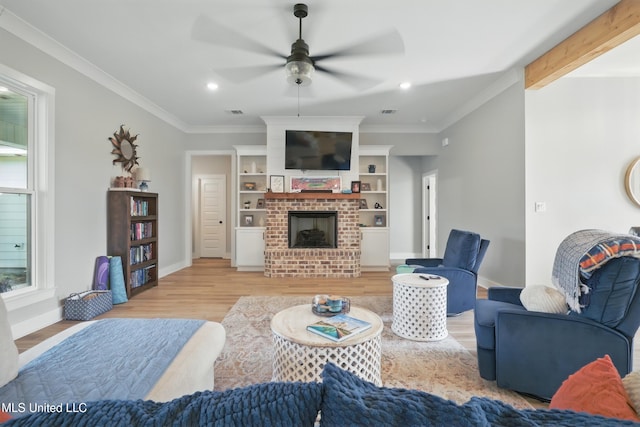 13240 Wolf River Rd, Gulfport, MS 39503 - living area featuring ceiling fan, crown molding, light wood finished floors, and recessed lighting