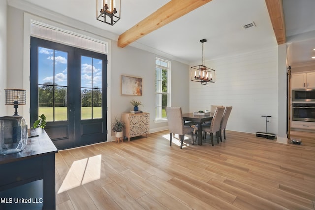 13240 Wolf River Rd, Gulfport, MS 39503 - dining space with french doors, light wood-style flooring, visible vents, a chandelier, and beamed ceiling