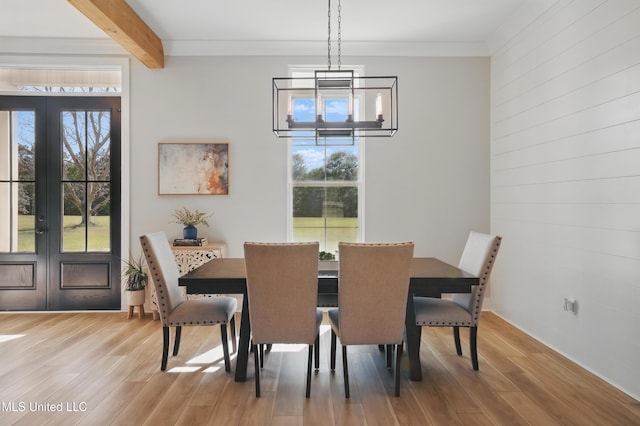 13240 Wolf River Rd, Gulfport, MS 39503 - dining area featuring a healthy amount of sunlight, french doors, and light wood-type flooring