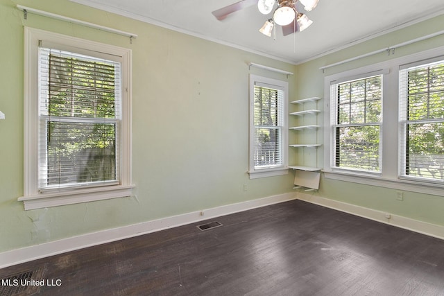 1521 Riverside Dr, Jackson, MS 39202 - spare room with ceiling fan, a wealth of natural light, and dark wood finished floors