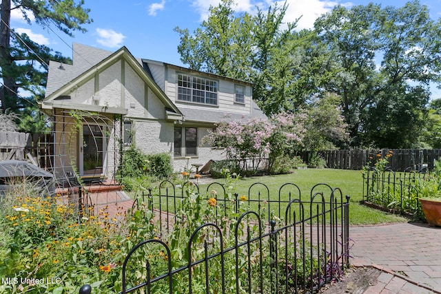 view of front of house with a front yard