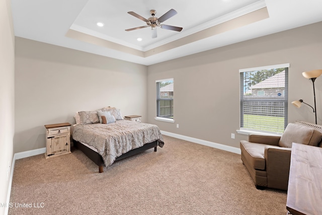 19489 Little Manatee St, Biloxi, MS 39532 - bedroom with a tray ceiling, light carpet, recessed lighting, crown molding, and baseboards
