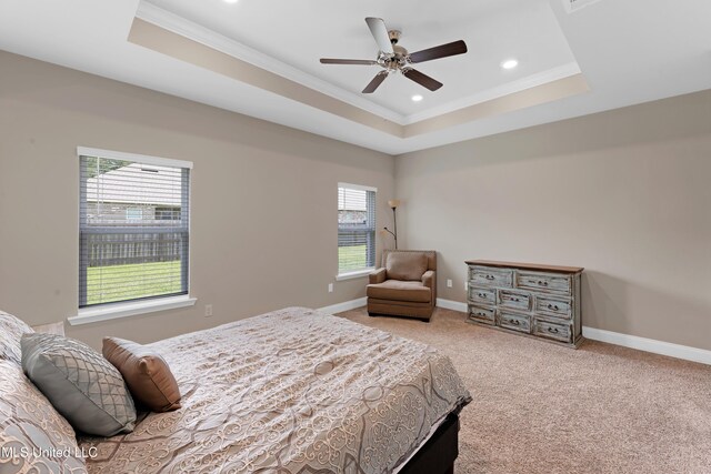 19489 Little Manatee St, Biloxi, MS 39532 - bedroom with a raised ceiling, crown molding, multiple windows, baseboards, and recessed lighting