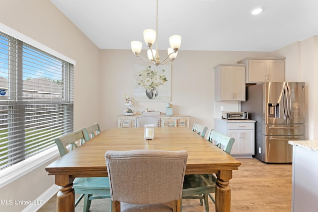 19489 Little Manatee St, Biloxi, MS 39532 - dining space featuring plenty of natural light, a chandelier, light wood finished floors, and recessed lighting