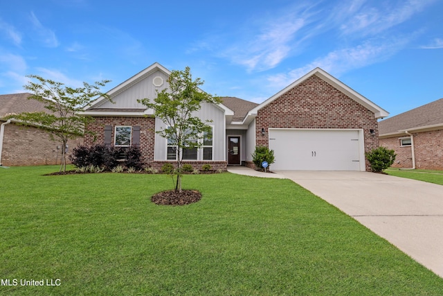 19489 Little Manatee St, Biloxi, MS 39532 - view of front of property with brick siding, driveway, an attached garage, board and batten siding, and a front lawn