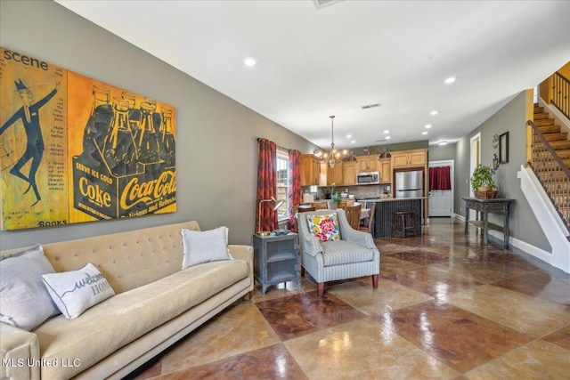 living room featuring an inviting chandelier