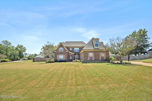 view of front facade with a front yard