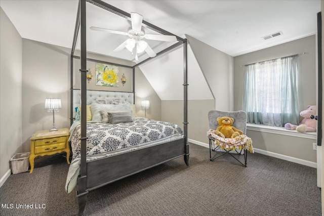 bedroom with ceiling fan, vaulted ceiling, and carpet floors