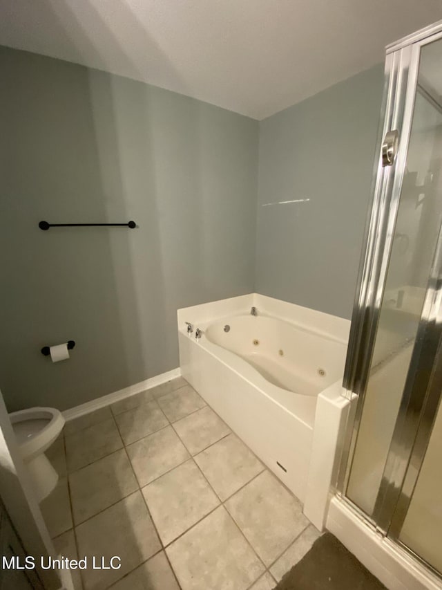 full bath with baseboards, toilet, a whirlpool tub, tile patterned flooring, and a shower stall