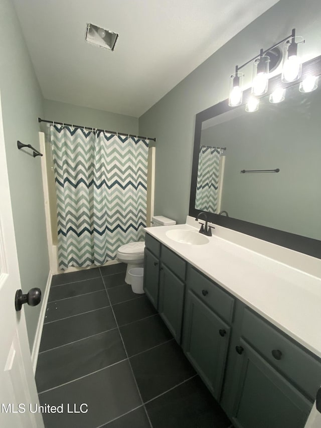 full bathroom with toilet, a shower with curtain, vanity, and tile patterned floors