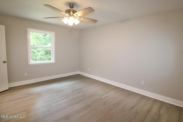 136 Childress Rd, Lucedale, MS 39452 - spare room with ceiling fan, wood finished floors, and baseboards