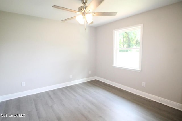 136 Childress Rd, Lucedale, MS 39452 - unfurnished room with ceiling fan, dark wood-style floors, and baseboards