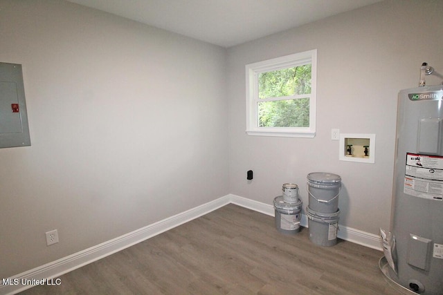 136 Childress Rd, Lucedale, MS 39452 - laundry area featuring water heater, electric panel, hookup for a washing machine, wood finished floors, and baseboards